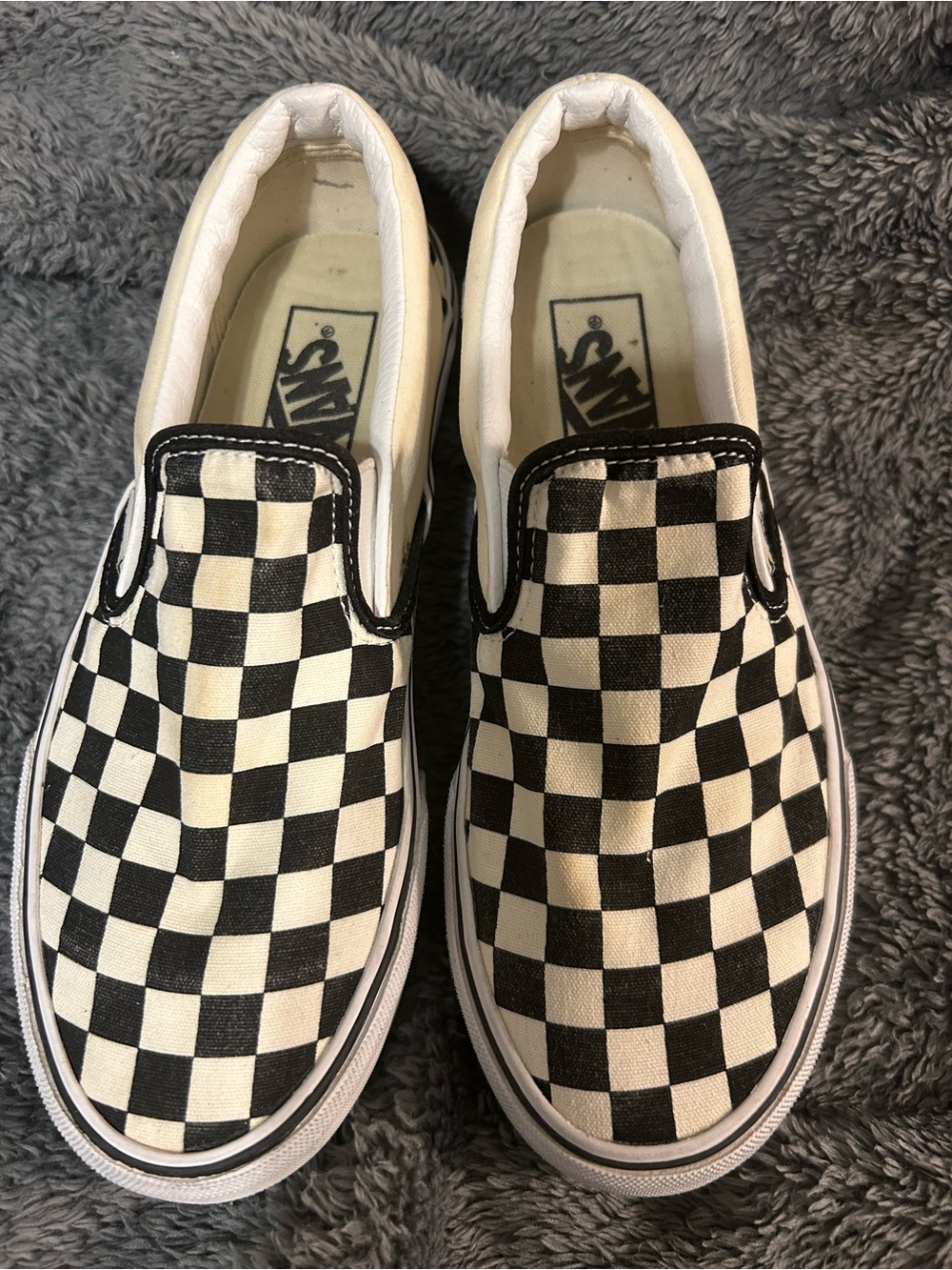 Vans Checkerboard Slip-On Sneakers in Black and White